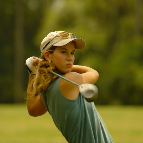 Golfer hitting a ball perfectly