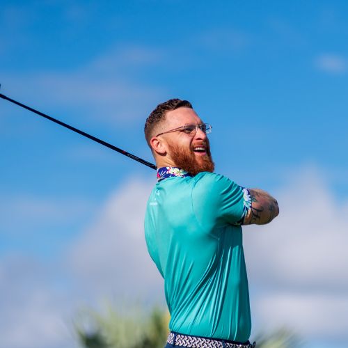 A golfer pleased with his shot