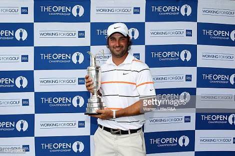 Andrew Georgiou of South Africa poses with the Claret Jug after qualifying for The Open Championship